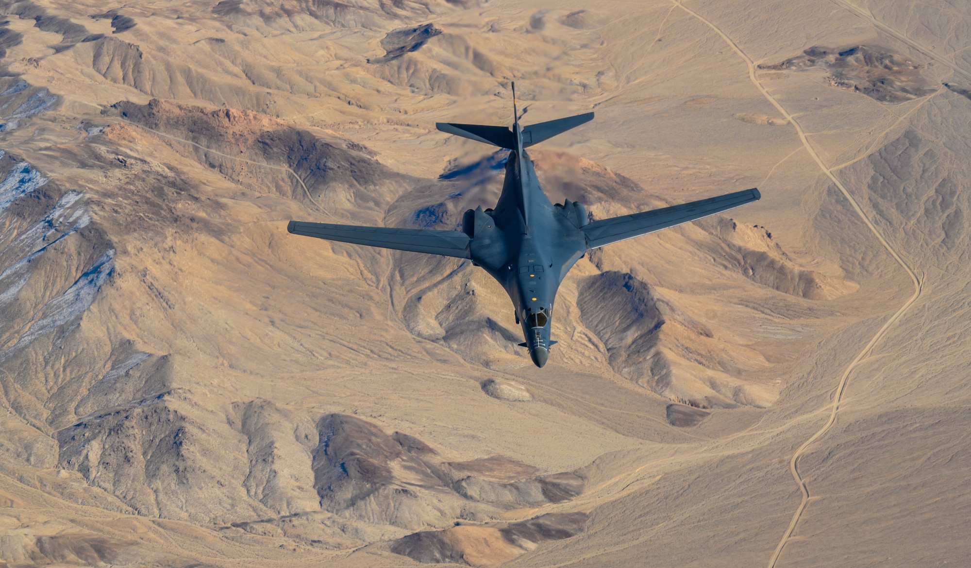 Aircraft flies over the Nevada Test and Training Range.