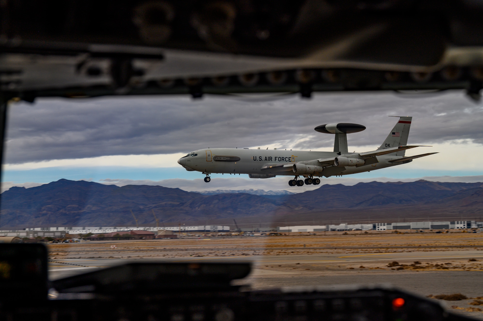 Aircraft lands on the flight line.