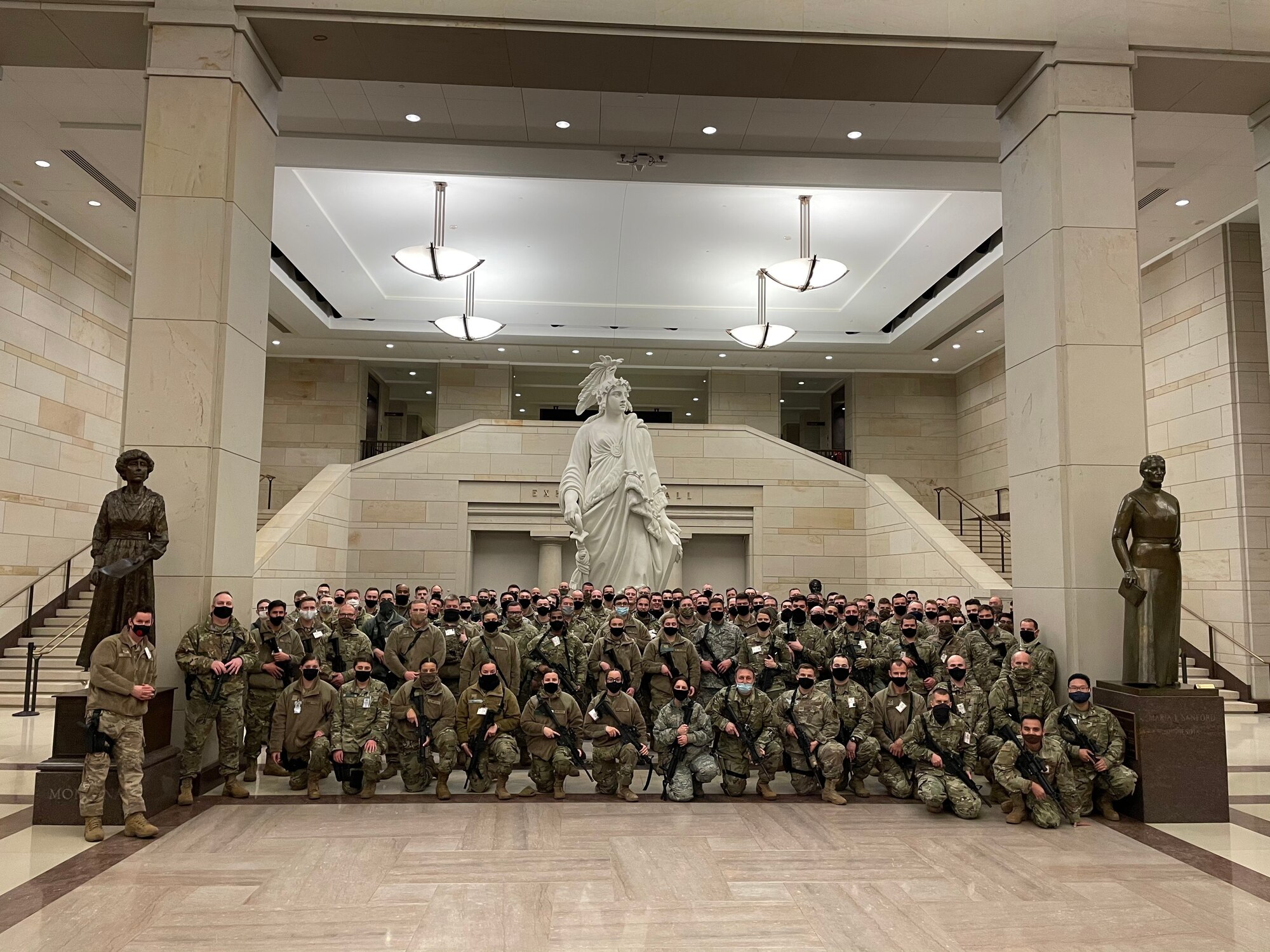Members from the 128th Air Refueling Wing along with the rest of Sijan Company pose for a group photo on the U.S. Capitol grounds Jan. 19, 2021. In the days leading up to the 59th presidential inauguration more than 125 Wisconsin Airmen from the 128th Air Refueling Wing, 115th Fighter Wing and Volk Field Combat Readiness Training Center mobilized to Washington D.C. to assist with security efforts for the event. (Courtesy Photo)