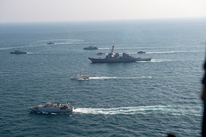 210124-N-XG173-1553 ARABIAN GULF (Jan. 24, 2020) Royal Saudi Naval Force ships and U.S. Navy sail in formation during exercise Nautical Defender (ND) 21 in the Arabian Gulf, Jan. 24. ND 21 is the capstone in a series of multi-national maritime security exercises designed to broaden levels of cooperation, support long-term regional security, and enhance military-to-military interoperability between the Kingdom of Saudi Arabia, UK and the U.S. (U.S. Navy photo by Mass Communication Specialist 2nd Class Aja Bleu Jackson)