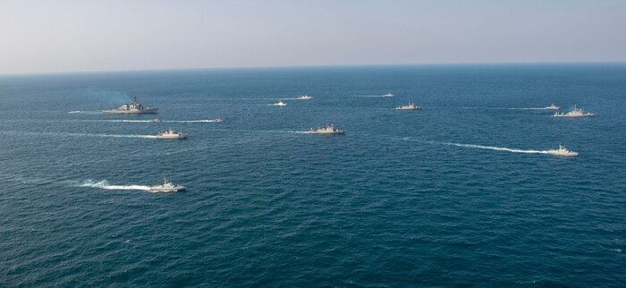 210124-N-XG173-1567 ARABIAN GULF (Jan. 24, 2020) Royal Saudi Naval Force ships and U.S. Navy sail in formation during exercise Nautical Defender (ND) 21 in the Arabian Gulf, Jan. 24. ND 21 is the capstone in a series of multi-national maritime security exercises designed to broaden levels of cooperation, support long-term regional security, and enhance military-to-military interoperability between the Kingdom of Saudi Arabia, UK and the U.S. (U.S. Navy photo by Mass Communication Specialist 2nd Class Aja Bleu Jackson)