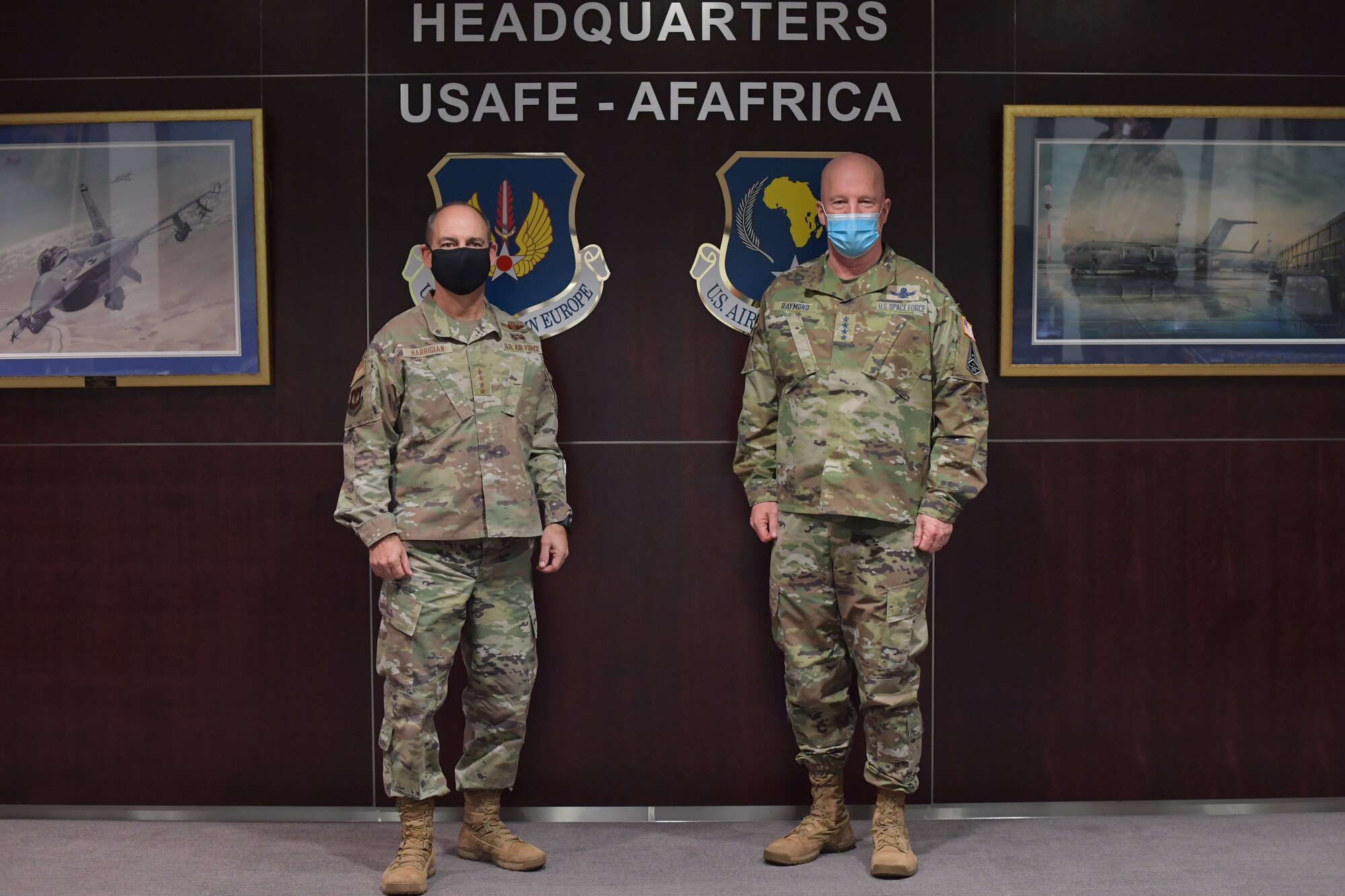 Generals standing in a command section room.