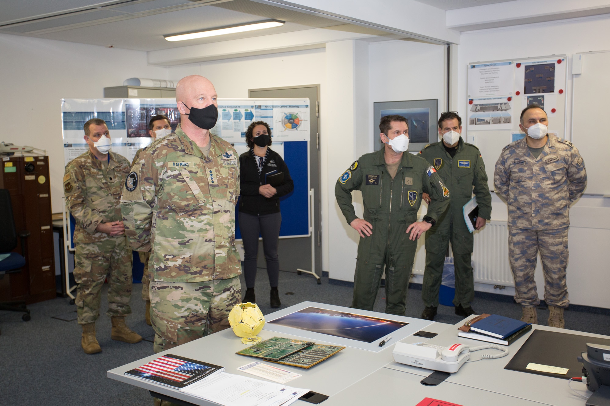 Space professionals standing in an office.