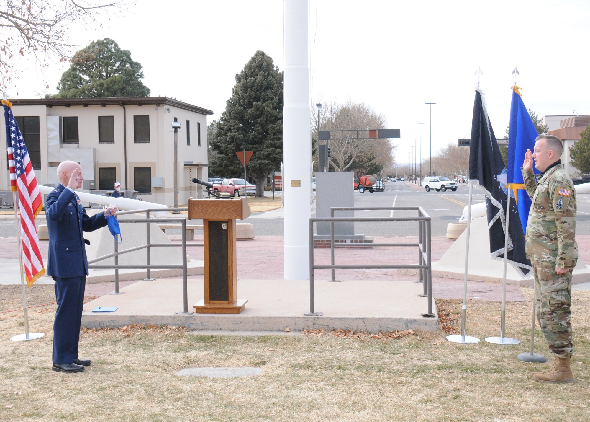 Col. Mike Mullane, USAF (ret.) administers the oath of office to Capt. David Buehler at an induction ceremony for Air Force Research Laboratory officers who transferred from the U.S. Air Force to the U.S. Space Force in a ceremony held Feb.1 at Kirtland AFB, N.M. (U.S. Air Force photo/John Michael Cochran)