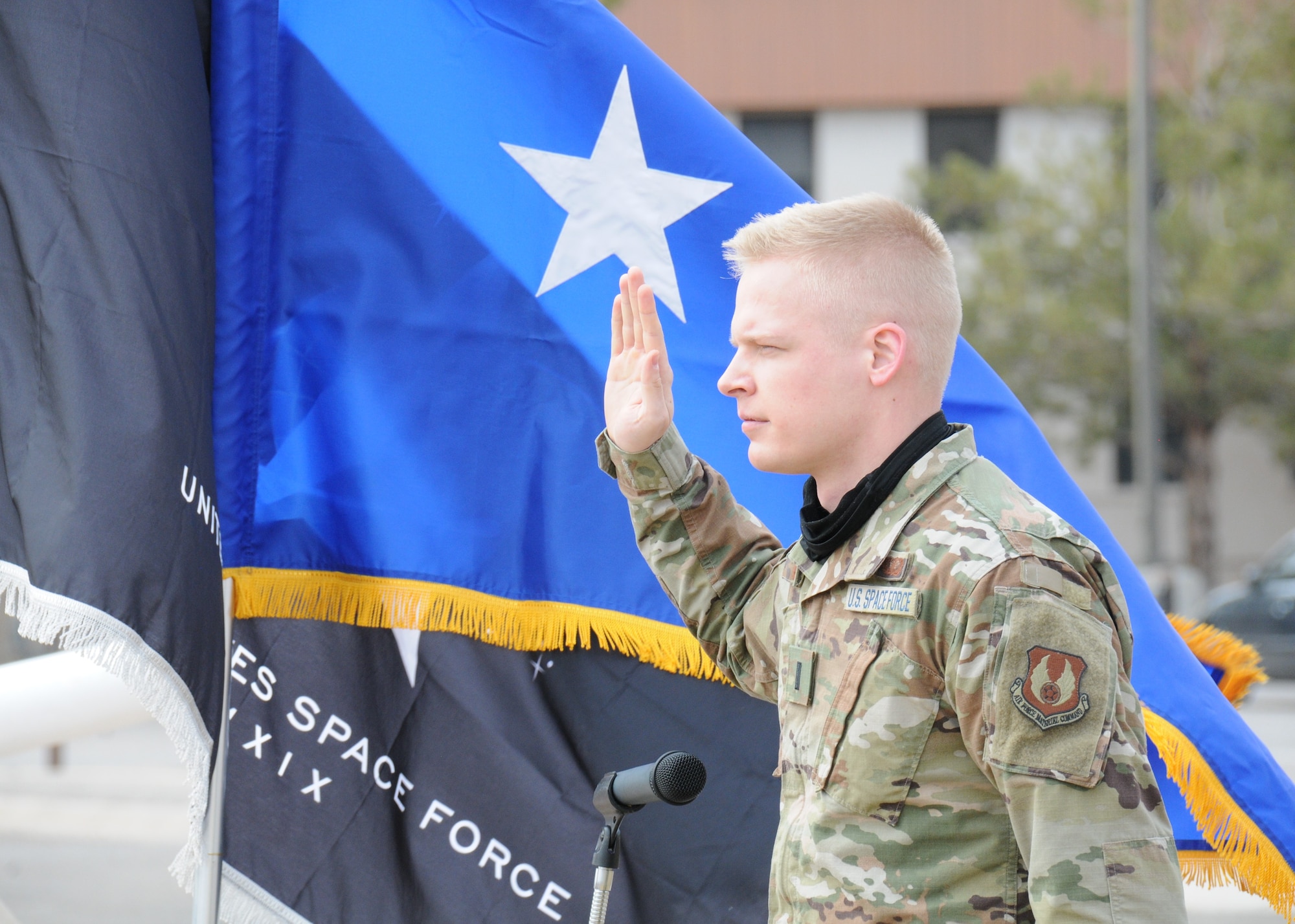 Air Force Research Laboratory engineer 1st Lt. Andrew Vogel takes the oath of office to transfer from the U.S. Air Force to the U.S. Space Force in an AFRL induction ceremony of 13 AFRL officers held Feb. 1 at Kirtland AFB, N.M. (U.S. Air Force photo/John Michael Cochran)