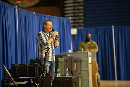 Comedian Rob Maher performs during a USO-sponsored event for National Guard men and women at the District of Columbia Armory Jan. 23, 2021. About 26,000 National Guard men and women conducted security, communication and logistical missions in support of federal and D.C. authorities leading up and through the presidential inauguration. About 7,900 Guard members remained in February.