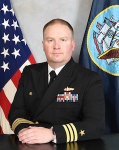 Studio portrait of Cmdr. Greg Page