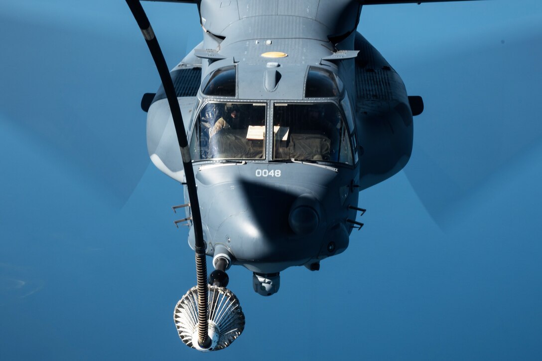 A U.S. Air Force KC-10 Extender refuels a CV-22 Osprey in the U.S. Central Command area of responsibility Jan. 29, 2021. The CV-22s mission is to conduct long-range infiltration, exfiltration and resupply missions in the USCENTCOM area of responsibility. (U.S. Air Force photo by Staff Sgt. Sean Carnes)