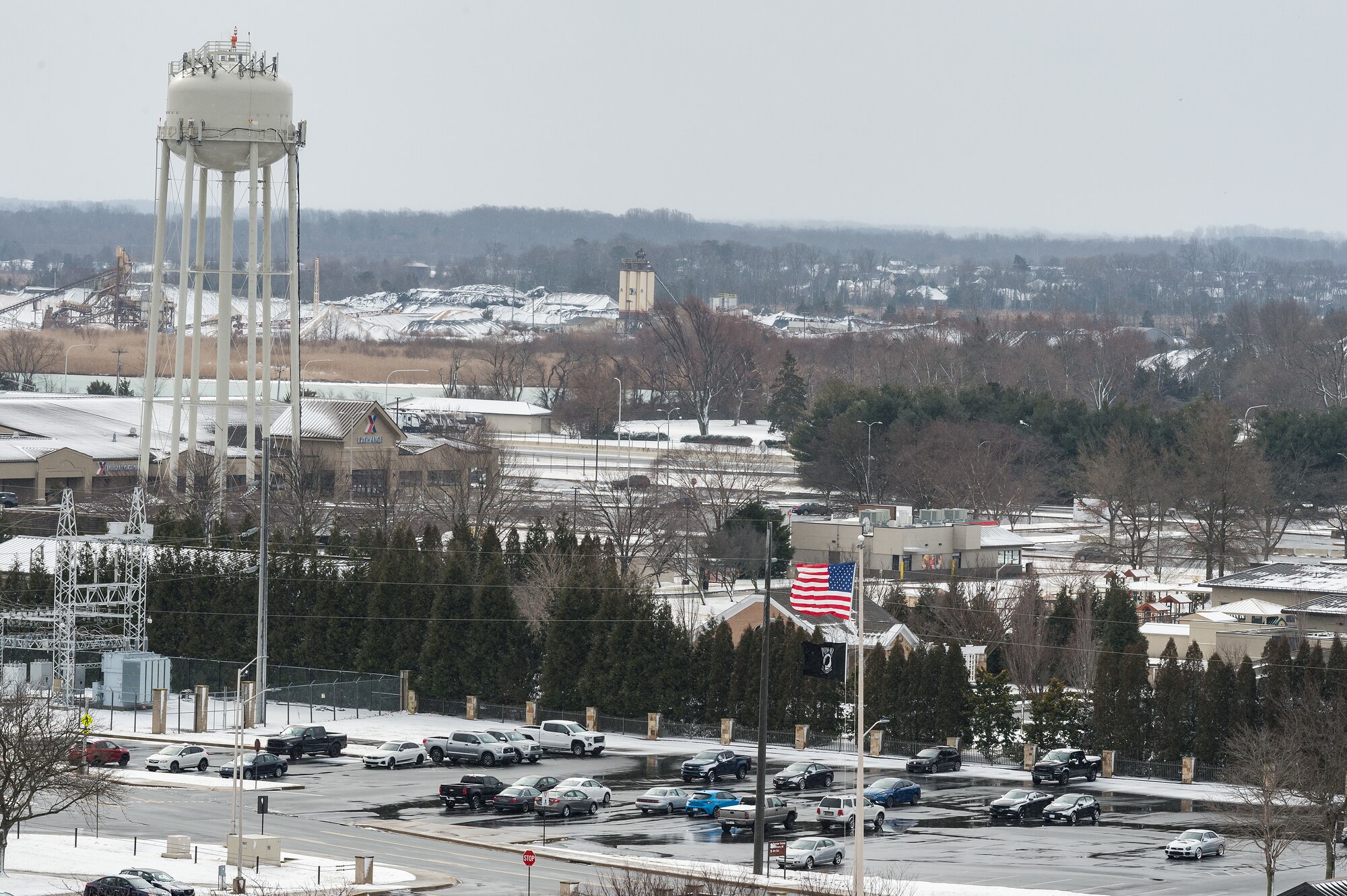 A view from the air traffic control tower of the base after a nor’easter produced snow showers at Dover Air Force Base, Delaware, Feb. 2, 2021. As snow fell, the base continued normal operations and prepared for additional forecast snowfall during the next day. (U.S. Air Force photo by Roland Balik)