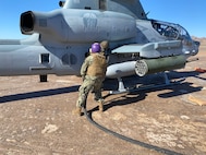 Sailors from Navy Cargo Handling Battalion (NCHB) 1, homeported in Williamsburg, Va. conduct refueling operations with Marines assigned to Marine Wing Support Squadron (MWSS) 371 during Exercise Winter Fury.