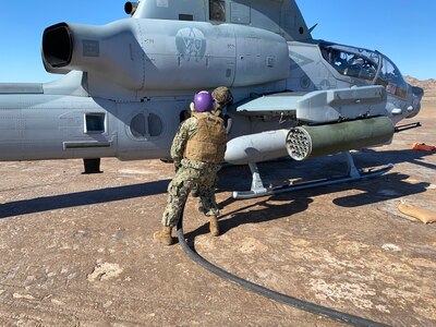 Sailors from Navy Cargo Handling Battalion (NCHB) 1, homeported in Williamsburg, Va. conduct refueling operations with Marines assigned to Marine Wing Support Squadron (MWSS) 371 during Exercise Winter Fury.