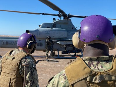 Sailors from Navy Cargo Handling Battalion (NCHB) 1, homeported in Williamsburg, Va. conduct refueling operations with Marines assigned to Marine Wing Support Squadron (MWSS) 371 during Exercise Winter Fury.