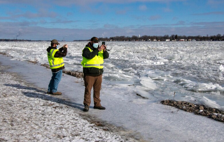 U.S. Army Corps of Engineers, Detroit District, field team Senior Hydraulic Engineer Matt McClerren, left, and Hydraulic Technician Jon DePhillips document St. Clair River ice jams