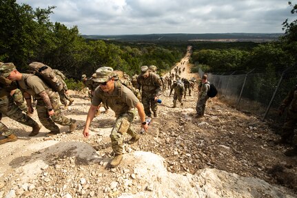 U.S. Air Force Defenders from the 343rd Training Squadron participate in 13th Annual Fallen Defender Ruck Nov. 6, 2020, at Joint Base San Antonio-Camp Bullis, Texas.
