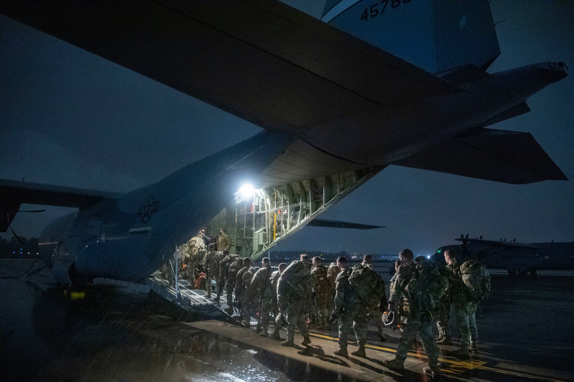 Paratroopers board a C-130J at Charleston.