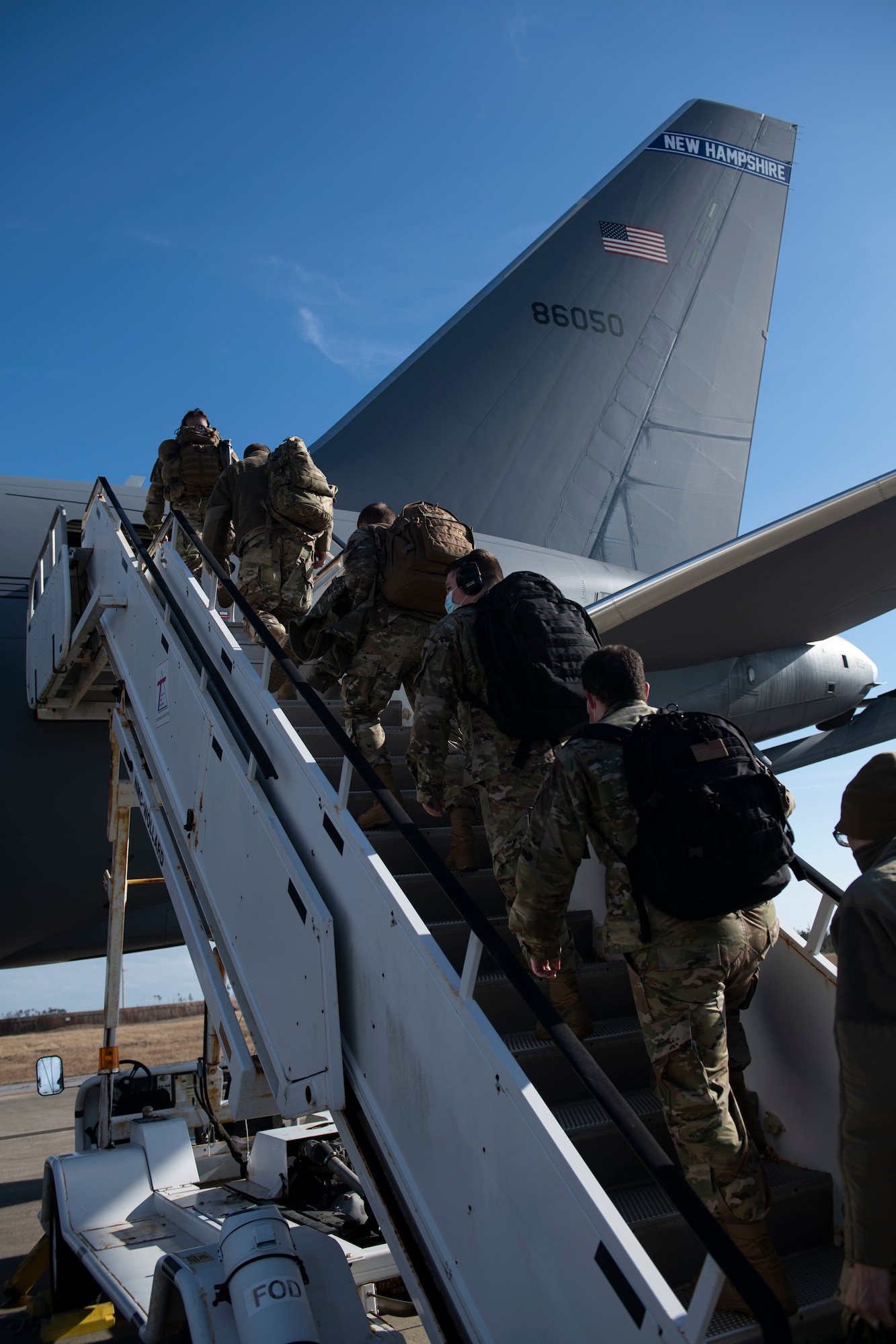 U.S. Air National Guardsmen with the 158th Fighter Wing, Vermont National Guard prepare to board a KC-46 Pegasus on Tyndall Air Force Base, Florida, Jan. 30, 2021. The aircraft made its first appearance at Tyndall to transport Airmen and cargo back to Vermont after a Weapons System Evaluation Program exercise. (U.S. Air Force photo by Airman 1st Class Tiffany Price)
