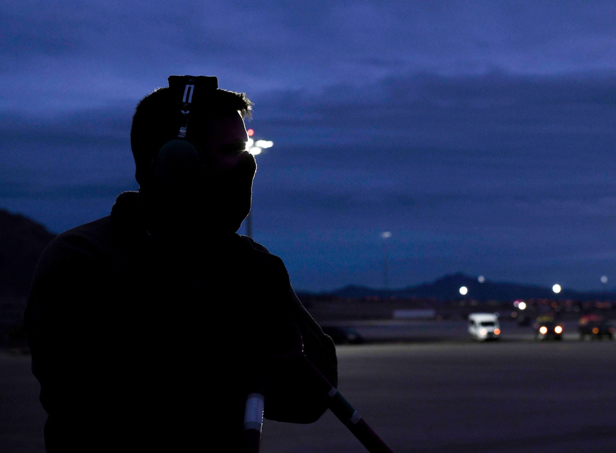 U.S. Air National Guard Staff Sgt. James Whitney, 131st Maintenance Squadron crew chief, waits to start a B-2 Spirit Stealth Bomber post-flight check during Red Flag 21-1, at Nellis Air Force Base, Nevada, Feb. 1, 2021. In order to ensure Team Whiteman always upholds its global deterrence responsibility, Red Flag challenged Airmen to operate in a limited environment to better enhance their readiness and ensure mission success. Aircrews rotated their mission duties throughout the large-force exercise, expanding their ability to plan and execute operations best fit for various contingency scenarios. (U.S. Air Force photo by Staff Sgt. Sadie Colbert)