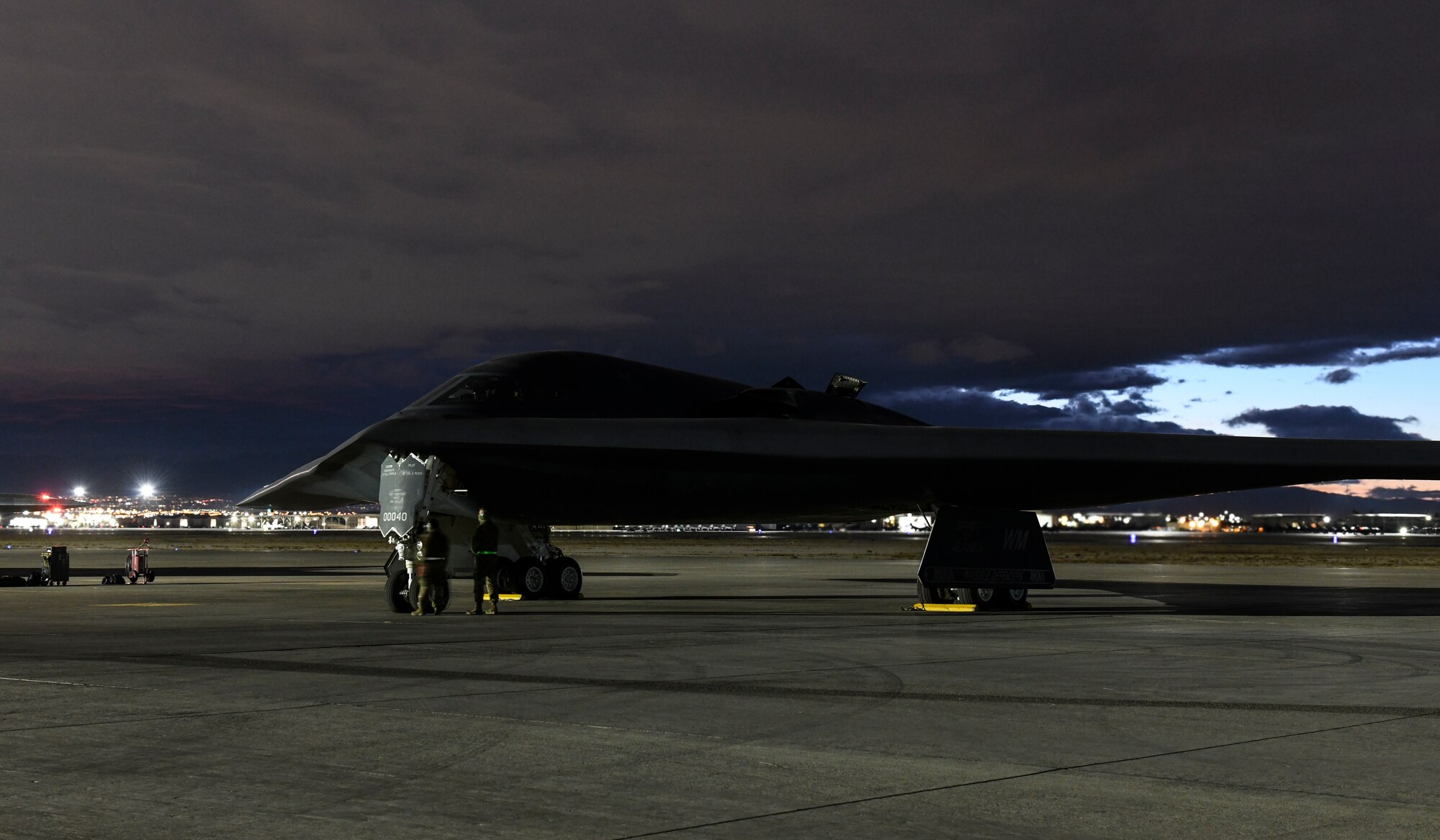 A B-2 Spirit Stealth Bomber sits on a flightline during Red Flag 21-1, at Nellis Air Force Base, Nevada, Feb. 1, 2021. During Red Flag 21-1, the 393rd Expeditionary Bomb Squadron flew B-2 Spirit Stealth Bomber training missions with multiple aircraft in order to further enhance their experience for future sorties. Aircrews rotated their mission duties throughout the large-force exercise, expanding their ability to plan and execute operations best fit for various contingency scenarios. (U.S. Air Force photo by Staff Sgt. Sadie Colbert)