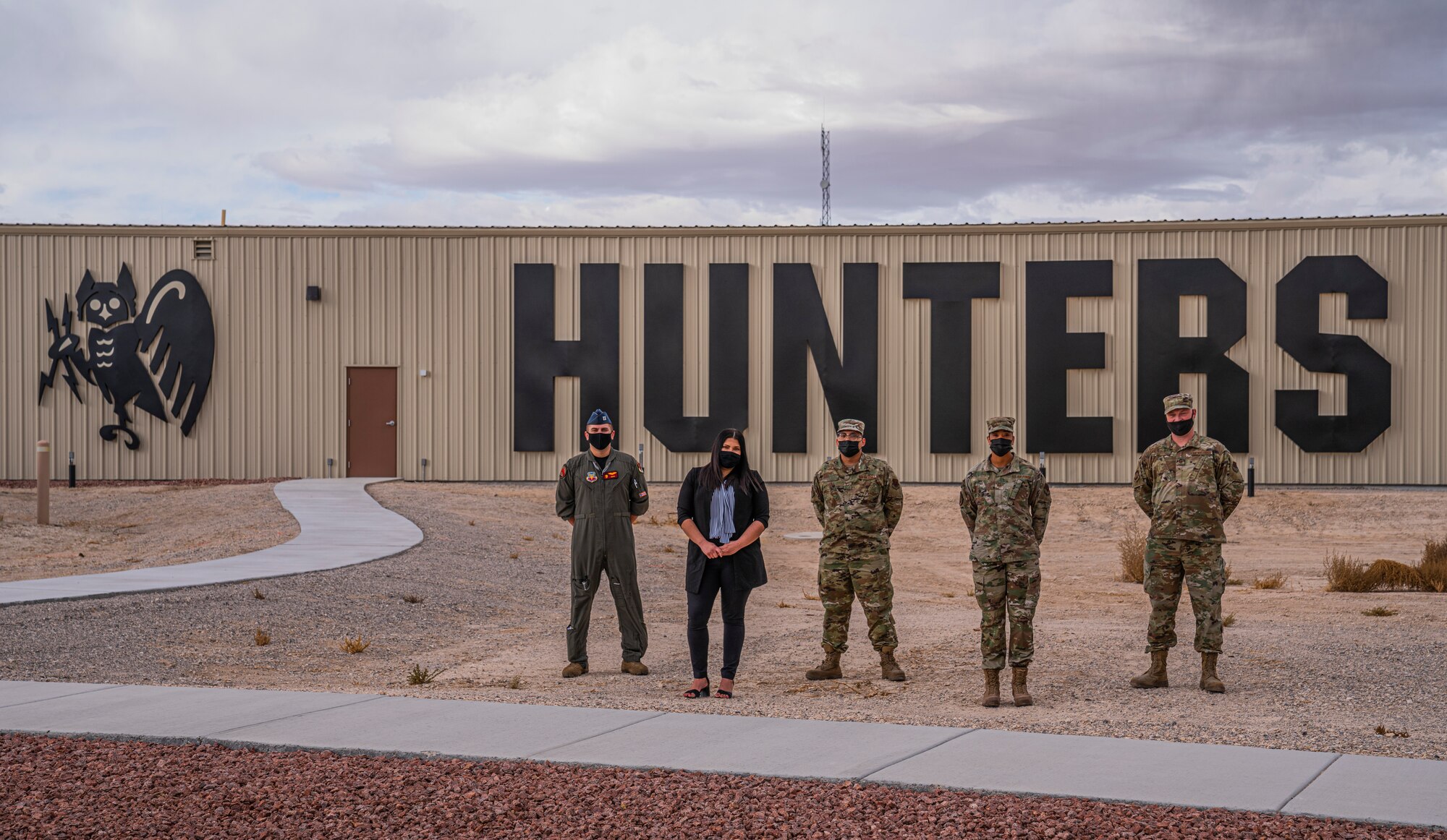 The Diversity and Inclusion Council stands together for a group photo at Creech Air Force Base