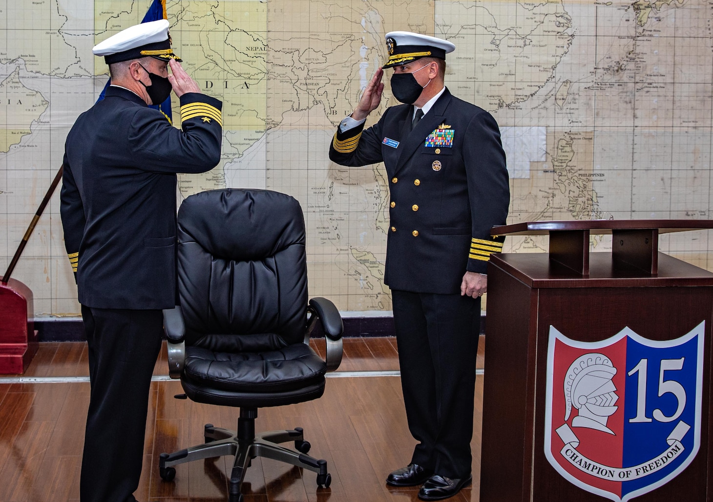 YOKOSUKA, Japan - Capt. Chase Sargeant relieves Capt. Steven. H. DeMoss as commander, Destroyer Squadron (DESRON) 15 during a change of command ceremony, Feb. 5, onboard Commander Fleet Activities Yokosuka, Japan. DESRON 15 is the Navy’s largest forward-deployed DESRON and the U.S. 7th Fleet’s principal surface force. (U.S. Navy photo by Mass Communication Specialist Seaman Justin Stack)