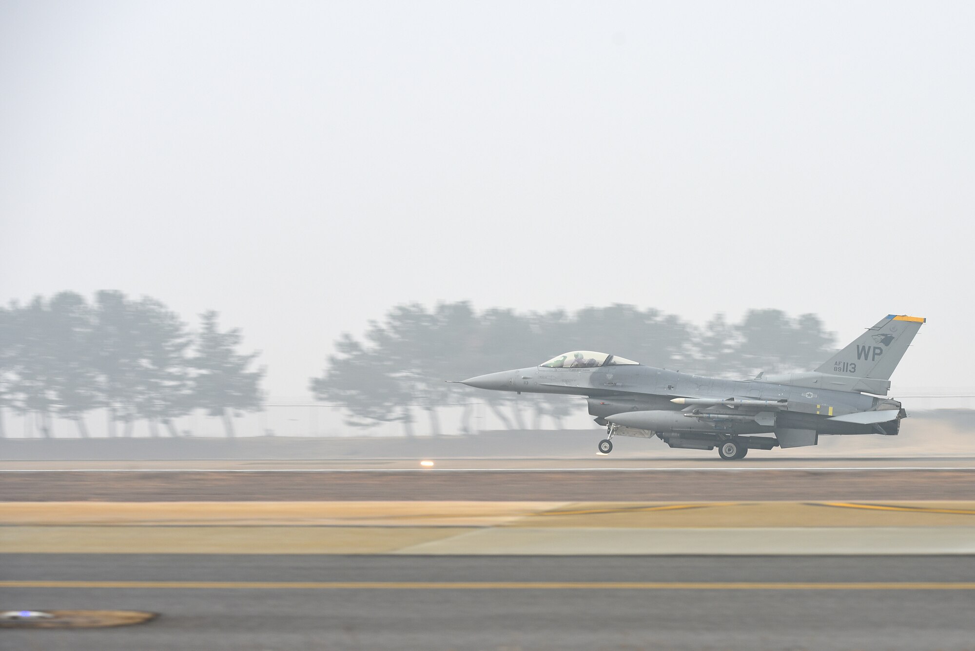 An F-16 Fighting Falcon assigned to the 8th Fighter Wing lands at Kunsan Air Base, Republic of Korea, Feb. 1, 2021. The F-16 is an all-weather, multi-role fighter aircraft, capable of air-to-air combat and air-to-surface attack.