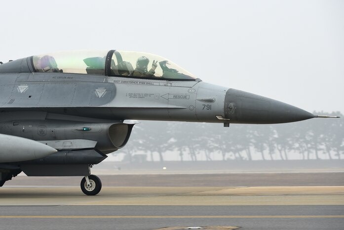 An 80th Fighter Squadron pilot taxis an F-16 Fighting Falcon on Kunsan Air Base, Republic of Korea, Feb. 1, 2021. With a full load of internal fuel, the F-16 can withstand up to nine times the force of gravity.