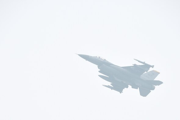 An F-16 Fighting Falcon assigned to the 80th Fighter Squadron flies over Kunsan Air Base, Republic of Korea, Feb. 1, 2021. The F-16 is an all-weather, multi-role fighter aircraft, capable of air-to-air combat and air-to-surface attack.