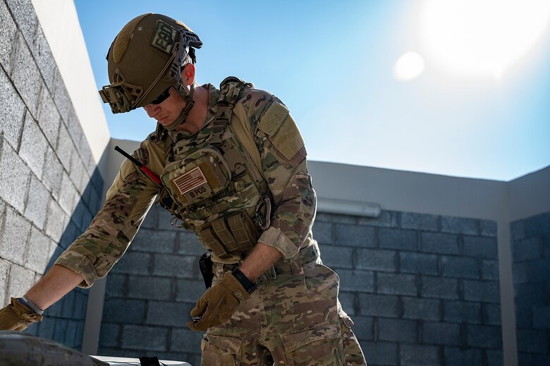 U.S. Air Force Staff Sgt. David Muray, 380th Expeditionary Civil Engineer Squadron explosive ordnance disposal (EOD) technician, locates simulated explosives during a training at Al Dhafra Air Base, United Arab Emirates, Jan. 28 2021.