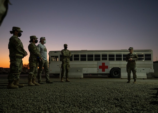 Participants in the 380th Air Expeditionary Wing (AEW) Honorary Members Program receive a briefing prior to a 380th Expeditionary Medical Group immersion event at Al Dhafra Air Base, United Arab Emirates, Jan. 28, 2021.