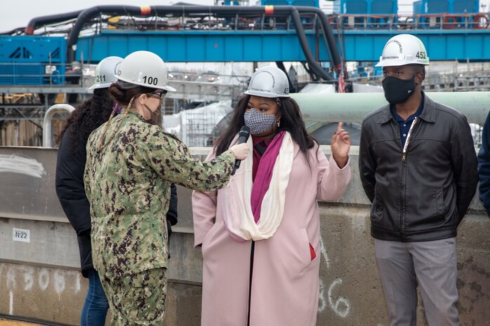 Supervisory Contract Specialist Tiffany Trotter spoke on the efforts of the team who came together to work an urgent contract for cleaning the sanitary tanks for USS Pasadena (SSN 752).