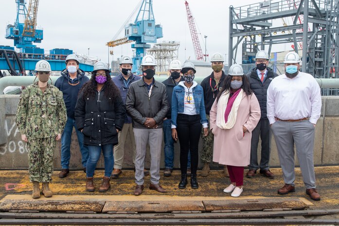 Capt. Dianna Wolfson surprised members of the Contracts Department (Code 400), Operations Department (Code 300) and Business Office (Code 1200) who worked an urgent contract for cleaning the sanitary tanks for USS Pasadena (SSN 752). She surprised the awardees on site at the Pasadena as part of the first episode of America’s Shipyard to recognize them for their efforts and to hear from them personally about what drives them each day as they serve America’s Shipyard. Bravo Zulu All!