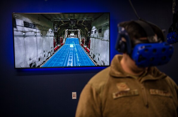 A virtual reality headset hangs from the ceiling in the 317th Maintenance Group’s VR Lab at Dyess Air Force Base, Texas, Jan. 20, 2021.