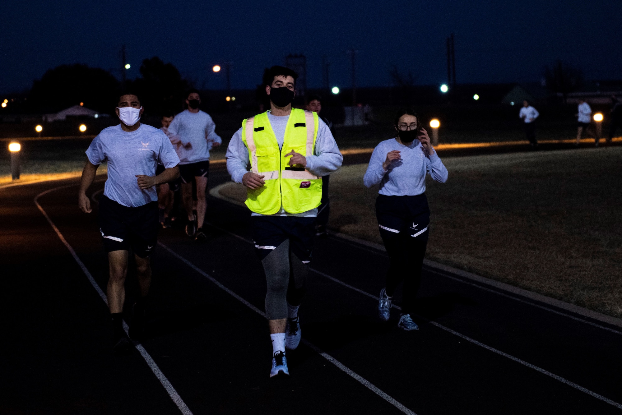 Student pilots starting off their morning PT with a mile and a half run on Feb. 01, 2021 at Laughlin Air Force Base, Texas. The students performed a three-mile run to adhere to Air Force standards. (U.S. Air Force photo by Airman 1st Class David Phaff)