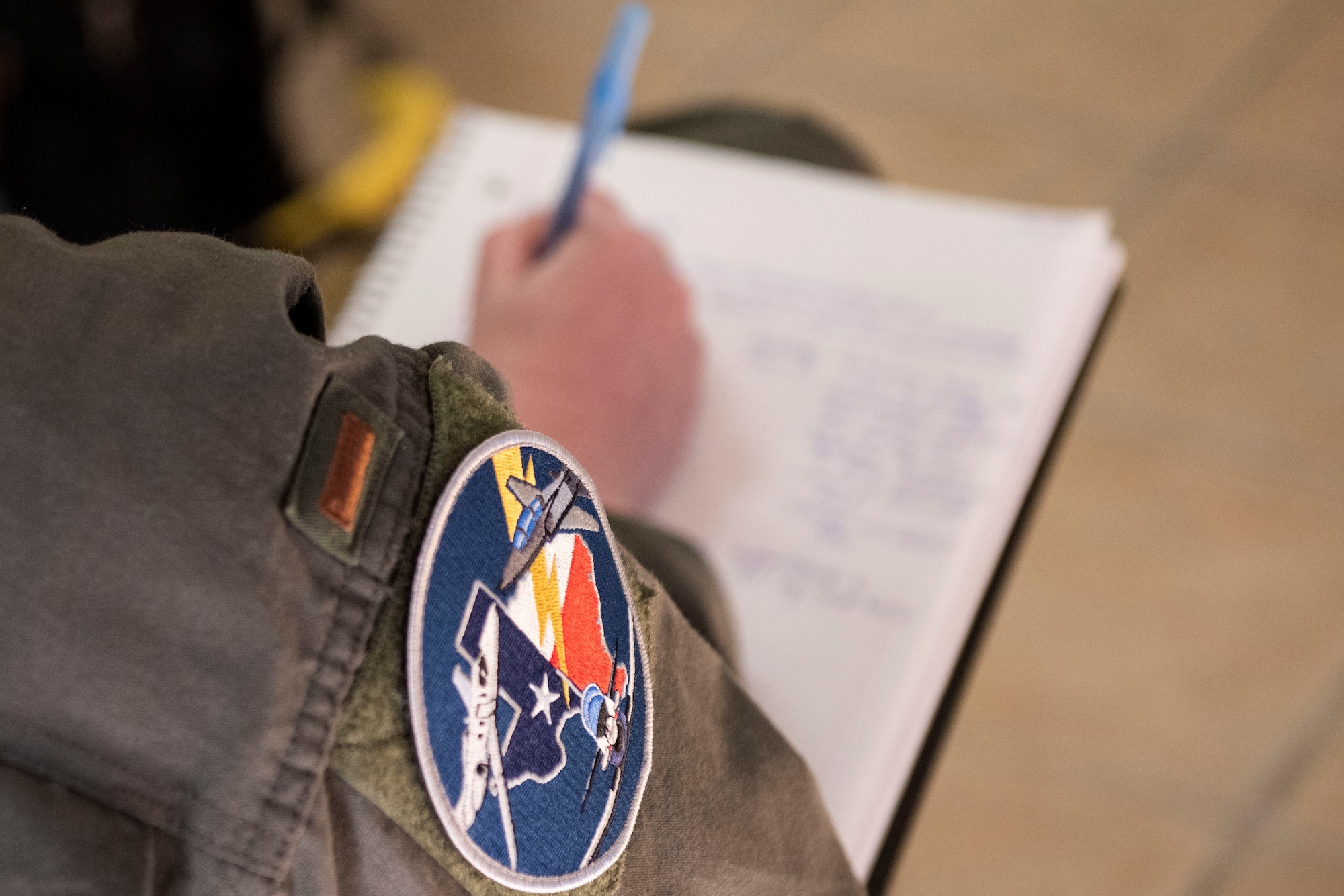 A Student pilot taking notes over the courses they will be expected to take during their course. Feb. 03, 2021 at Laughlin Air Force Base, Texas. Students must have a good study habit and time management skills to be able to keep up with the workload. (U.S. Air Force photo by Airman 1st Class David Phaff)