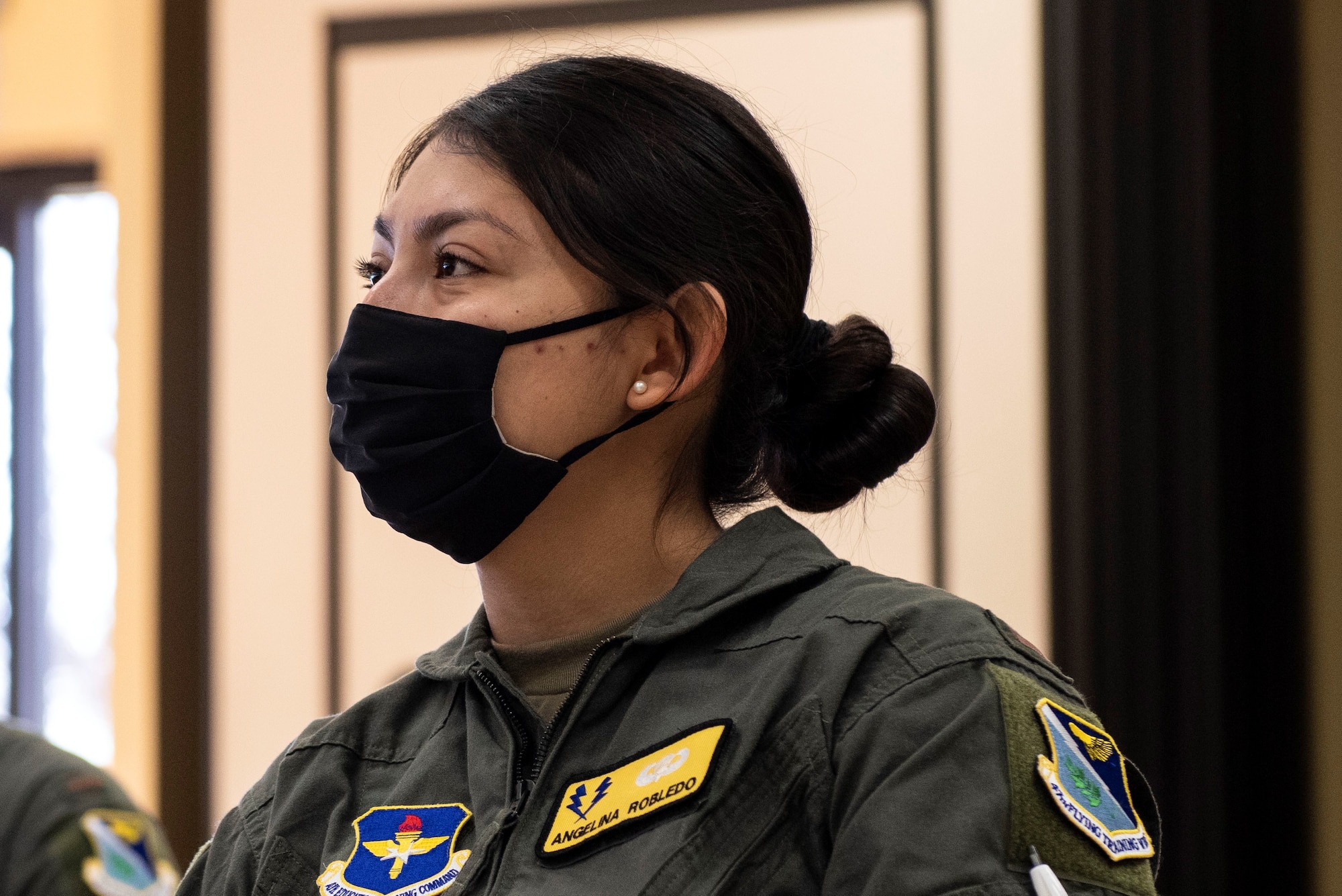 1st Lt. Angelina Robledo 47th Training Wing, student pilot, listens to a lecture from an instructor pilot Feb. 03, 2021 at Laughlin Air Force Base, Texas. This course is a newly implements tool to help prepare student pilots for their pilot training.