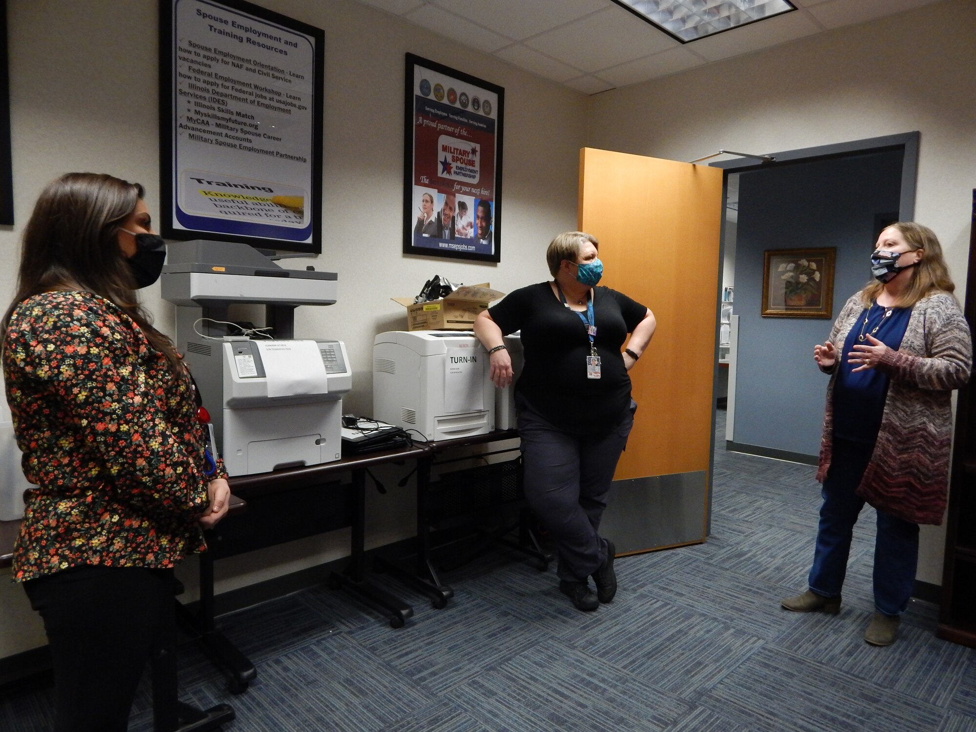 Women standing in room