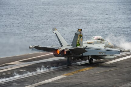 An E/A-18G Growler, attached to the "Zappers" of Electronic Attack Squadron (VAQ) 130, launches from the flight deck aboard the Nimitz-class aircraft carrier USS Dwight D. Eisenhower (CVN 69).