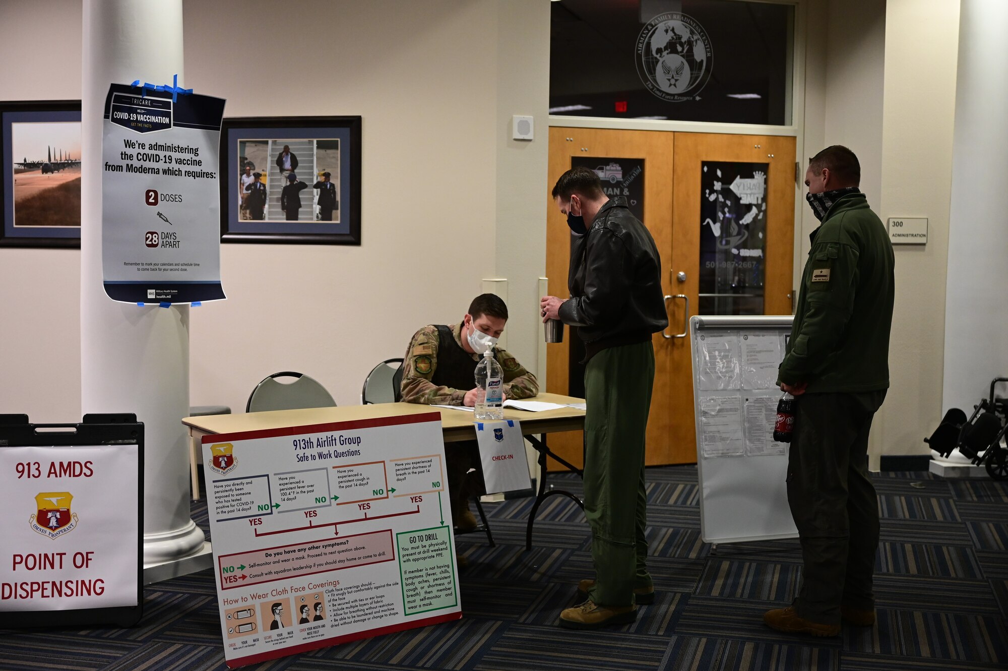 Air Force Reserve members of the 913th Airlift Group check-in to be offered the voluntary Moderna COVID-19 vaccine at Little Rock Air Force Base, Ark., Feb. 7, 2021. The Moderna COVID-19 Vaccine is given in two doses and is 94.1% effective, according to the Centers for Disease Control and Prevention. (U.S. Air Force Reserve photo by Airman 1st Class Julia Ford)