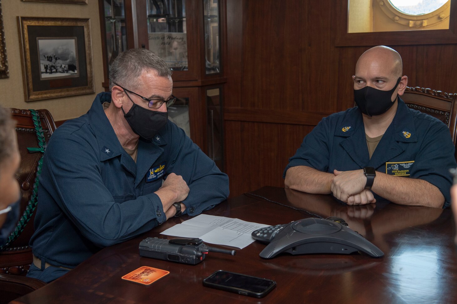 210208-N-DQ752-1001 SOUTH CHINA SEA (Feb. 8, 2021) Rear Adm. Jim Kirk, commander, Nimitz Carrier Strike Group, and Senior Chief Aviation Ordnanceman Chad McCraken, a native of Newark, Del., speak with President Joe Biden during a conference call aboard the aircraft carrier USS Nimitz (CVN 68). Nimitz is part of the Nimitz Carrier Strike Group and is deployed conducting maritime security operations and theater security cooperation efforts. (U.S. Navy photo by Mass Communication Specialist 3rd Class Cheyenne Geletka/Released)