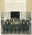 A photograph of the Commandant RADM Frederick Billard and the administrative staff of the U.S. Coast Guard in front of USCG HQ in Washington, D.C.  In the back row, second from left, stands CDR Russell R. Waesche.