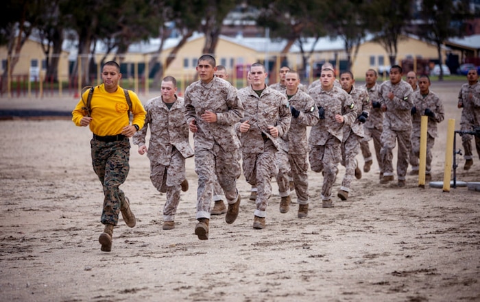 Recruits with Golf Company, 2nd Recruit Training Battalion, participate in the Confidence Course at Marine Corps Recruit Depot, San Diego, Feb. 1, 2021.