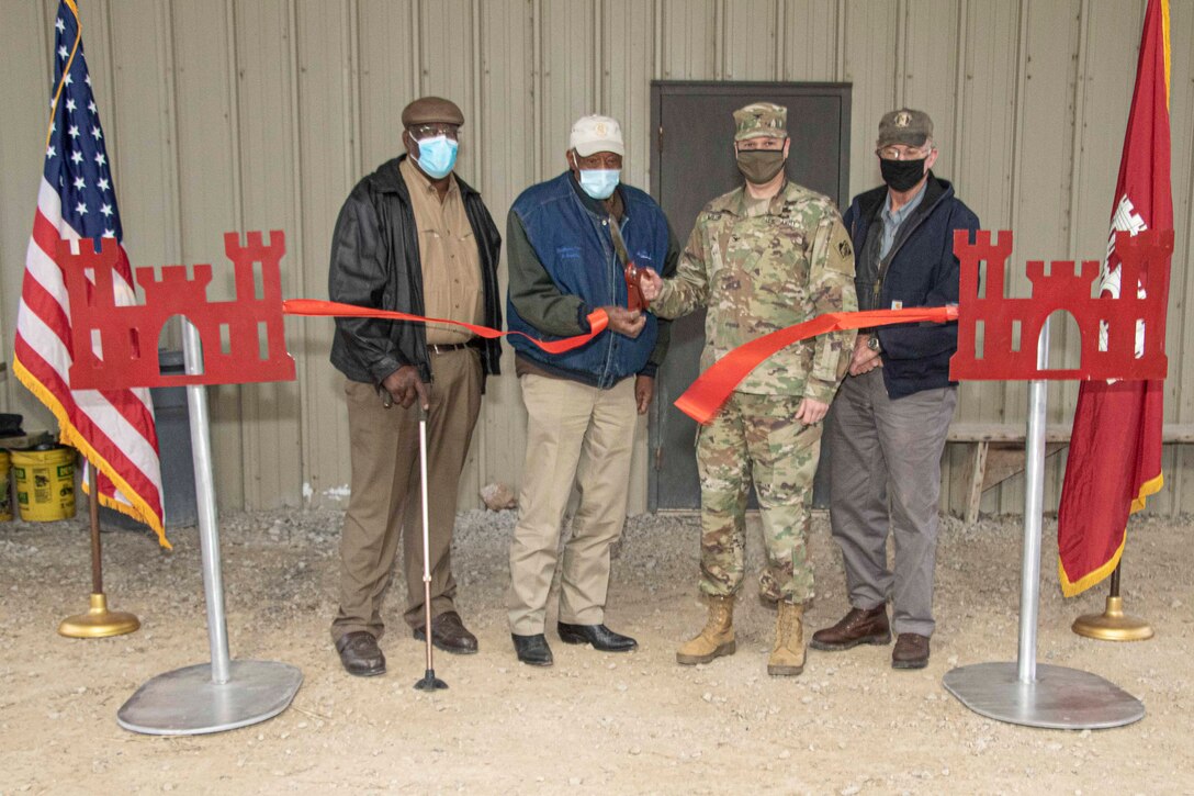 IN THE PHOTO, Memphis District Commander Col. Zachary Miller, the district partner, and other district team members are briefed on the details of the project. Afterward, the group held a ribbon-cutting ceremony, symbolizing the victory and celebration of completing yet another significant project. (USACE photos by Vance Harris)