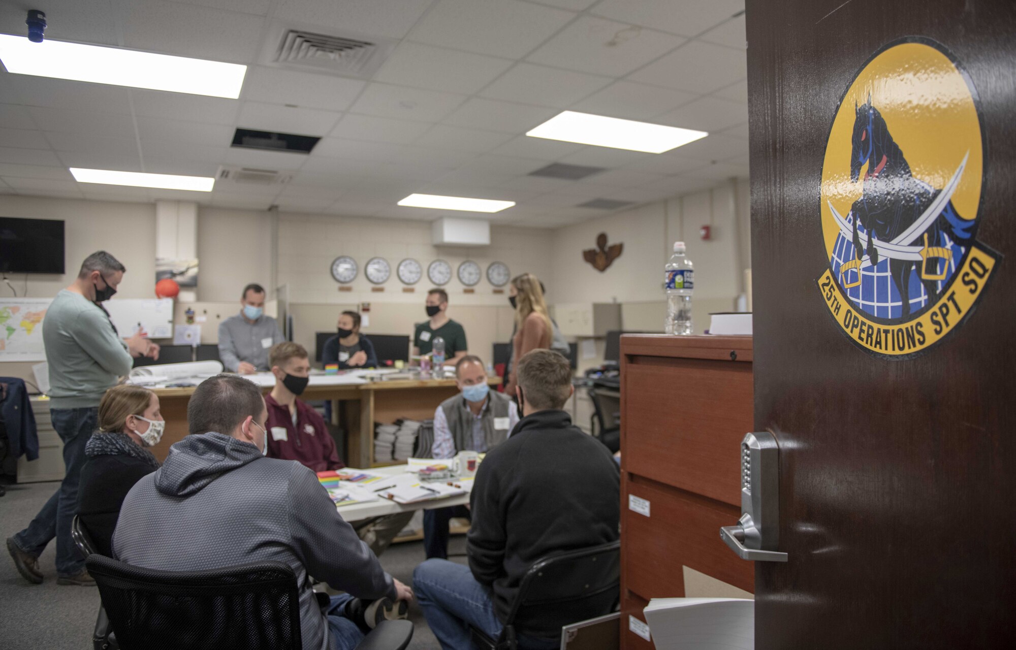 U.S. Airmen assigned to the 25th Attack Group collaborate during the 25th Operations Support Squadron Warhorse ReOrg Sprint at Shaw Air Force Base.