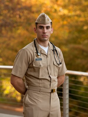 GREENVILLE, S.C. — Navy Reserve Ensign Fernando Gonzalez stands in front of the University of South Carolina School of Medicine Greenville. Photo courtesy of Mark Massingill.