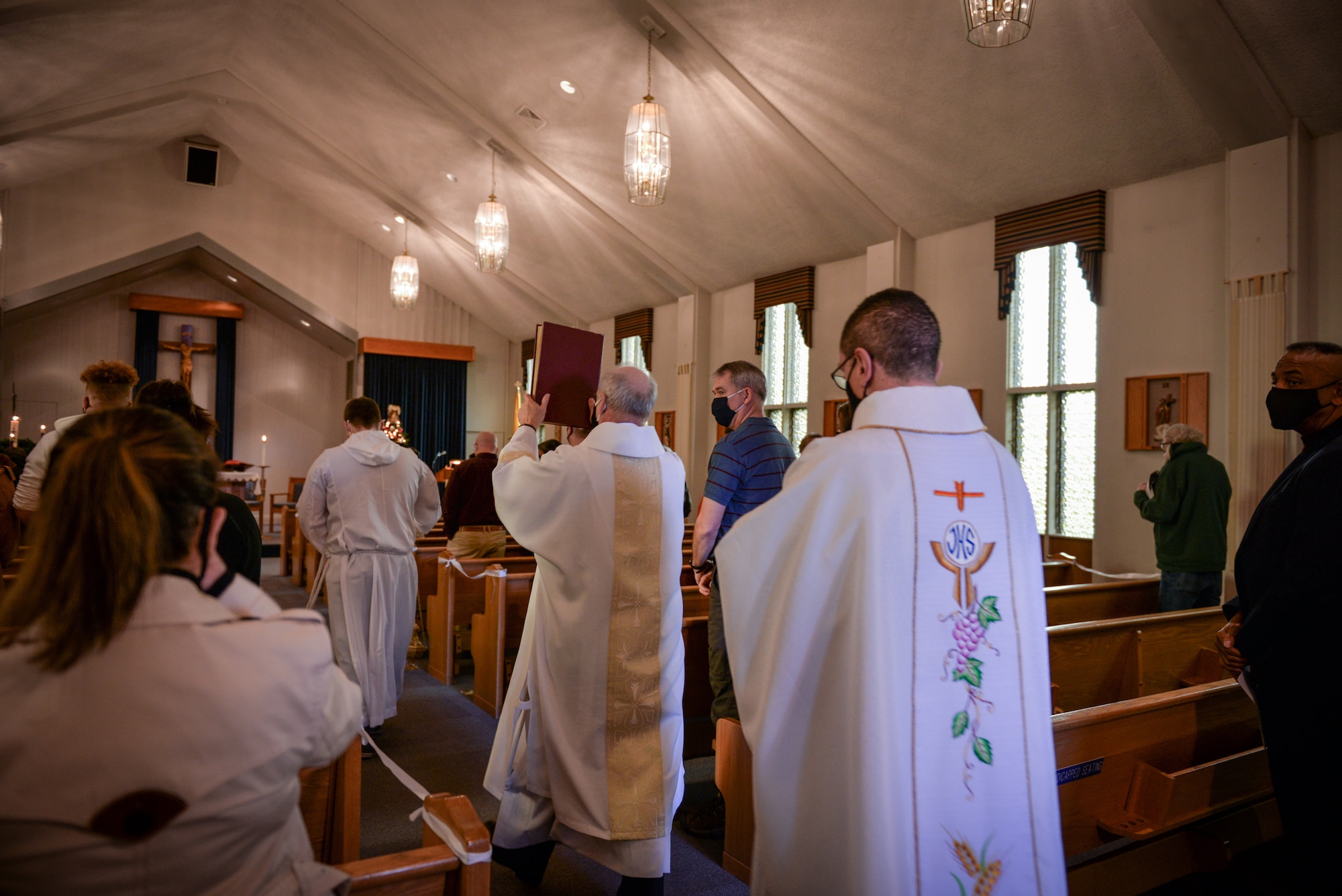 Chapel support staff assigned to Joint Base Lewis-McChord celebrate Mass at the base chapel Jan.10, 2021 here.