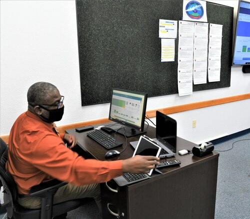 man at computer