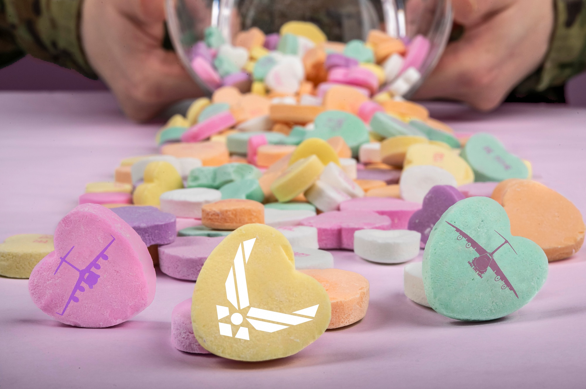 This Valentine’s Day photo illustration was created to wish everyone a safe and happy Valentine’s Day from the 436th Airlift Wing at Dover Air Force Base, Delaware. (U.S. Air Force photo illustration by Senior Airman Christopher Quail) (This image was created by making the tabletop lavender, adding the U.S. Air Force symbol, a C-17 Globemaster III and C-5 Super Galaxy design.)