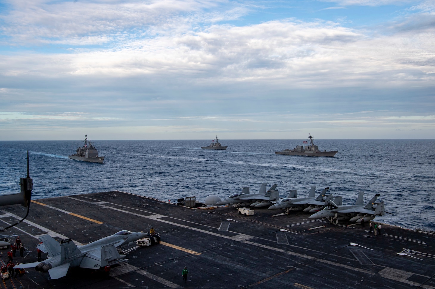 SOUTH CHINA SEA (Feb. 9, 2021) – The Theodore Roosevelt Carrier Strike Group transits in formation with the Nimitz Carrier Strike Group in the South China Sea Feb. 9, 2021. The Theodore Roosevelt and Nimitz Carrier Strike Groups are conducting dual-carrier operations during their deployments to the 7th Fleet area of operations. As the U.S. Navy's largest forward-deployed fleet, 7th Fleet routinely operates and interacts with 35 maritime nations while conducting missions to preserve and protect a free and open Indo-Pacific Region. (U.S. Navy photo by Mass Communication Specialist Seaman Deirdre Marsac)