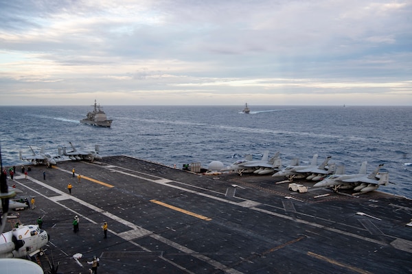 The Theodore Roosevelt  and Nimitz Carrier Strike Groups transit the South China Sea.