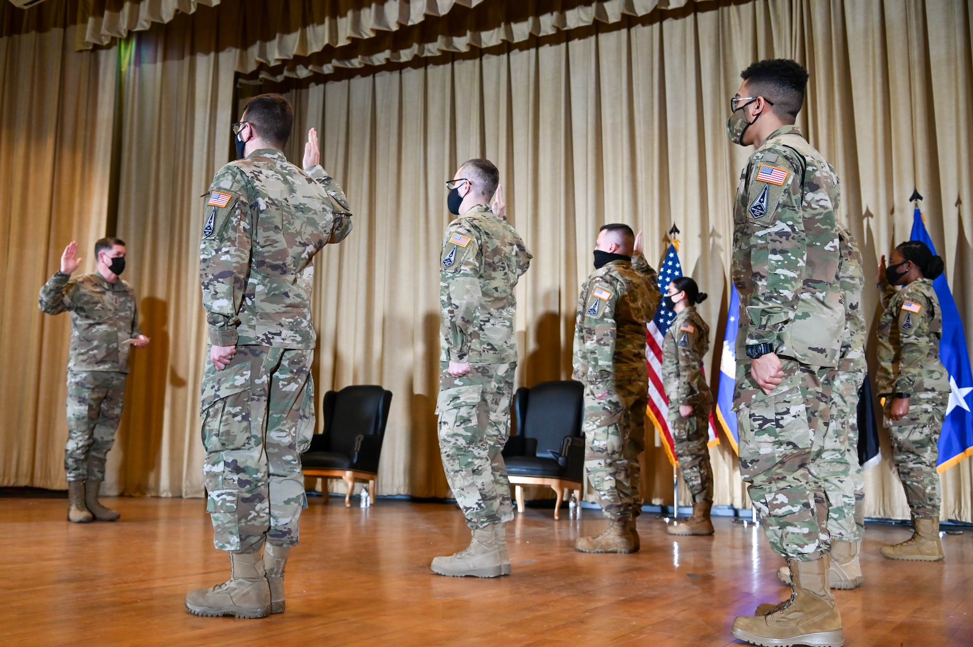 Enlisted inductees give the Oath of Office at the U.S. Space Force Induction Ceremony by Lt. Gen. Gene Kirkland.